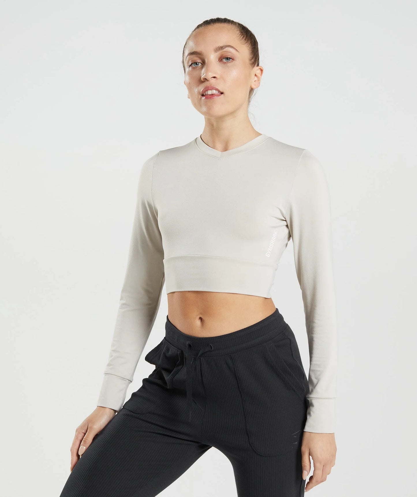 GYMSHARK crop tops ar garām piedurknēm gaiši pelēks